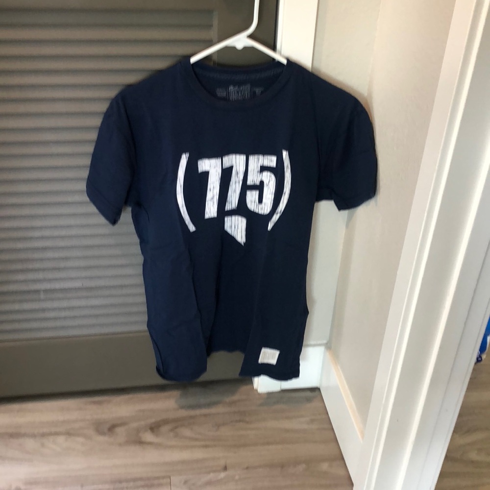 Retro brand Reno NV area code 775 navy blue mens medium sz T-shirt used mildly